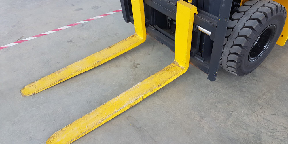 forklift clamp appliance crush damage
