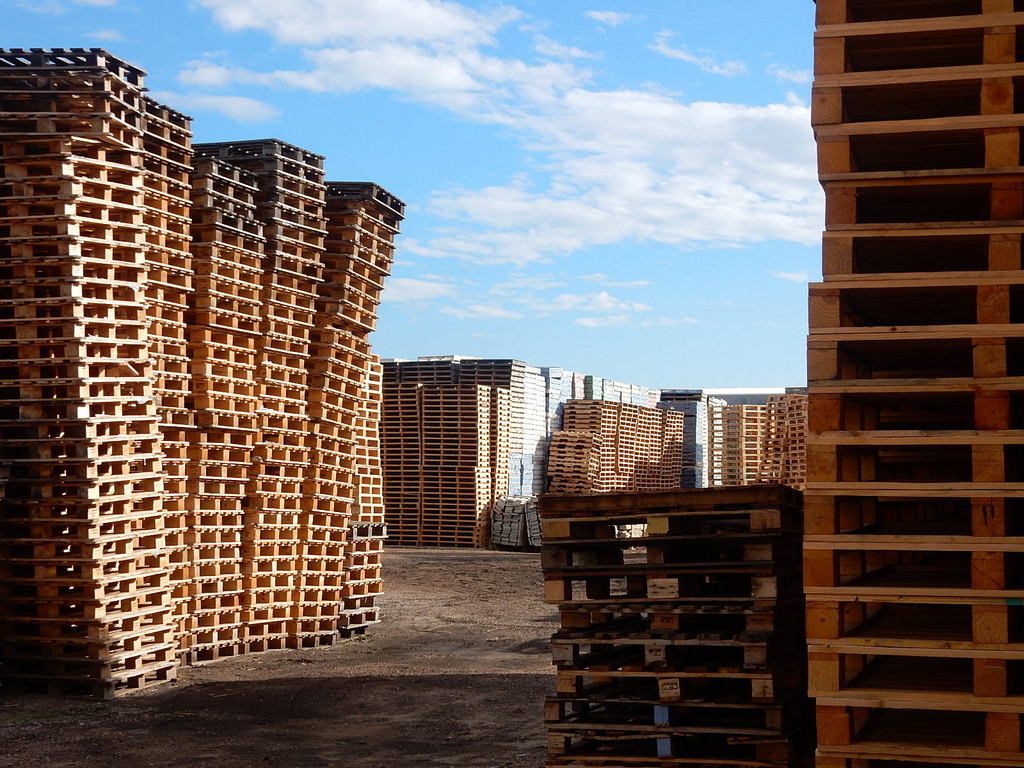 Empty pallets stacked too high.