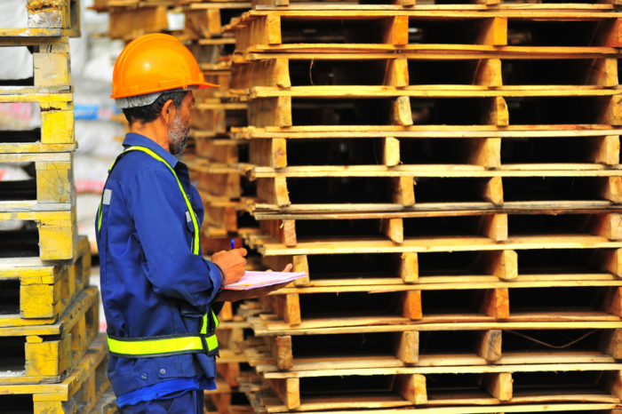 Wood stringer pallet inspection at the warehouse