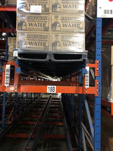Plastic pallet used in conjunction with warehouse automation.