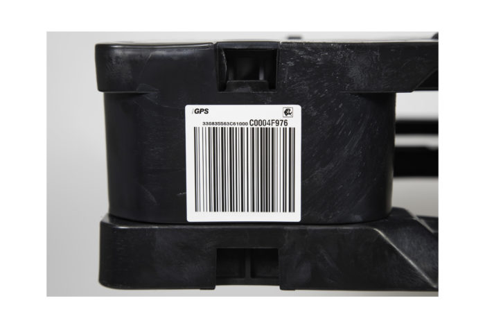 Plastic pallets have barcodes and embedded RFID tags for easy pharmaceutical tracking.