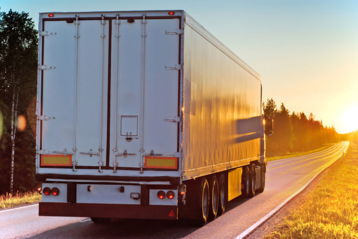 truck on road in evening