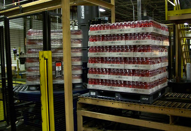 plastic beverage bottles shipped on igps plastic pallets in automated warehouse